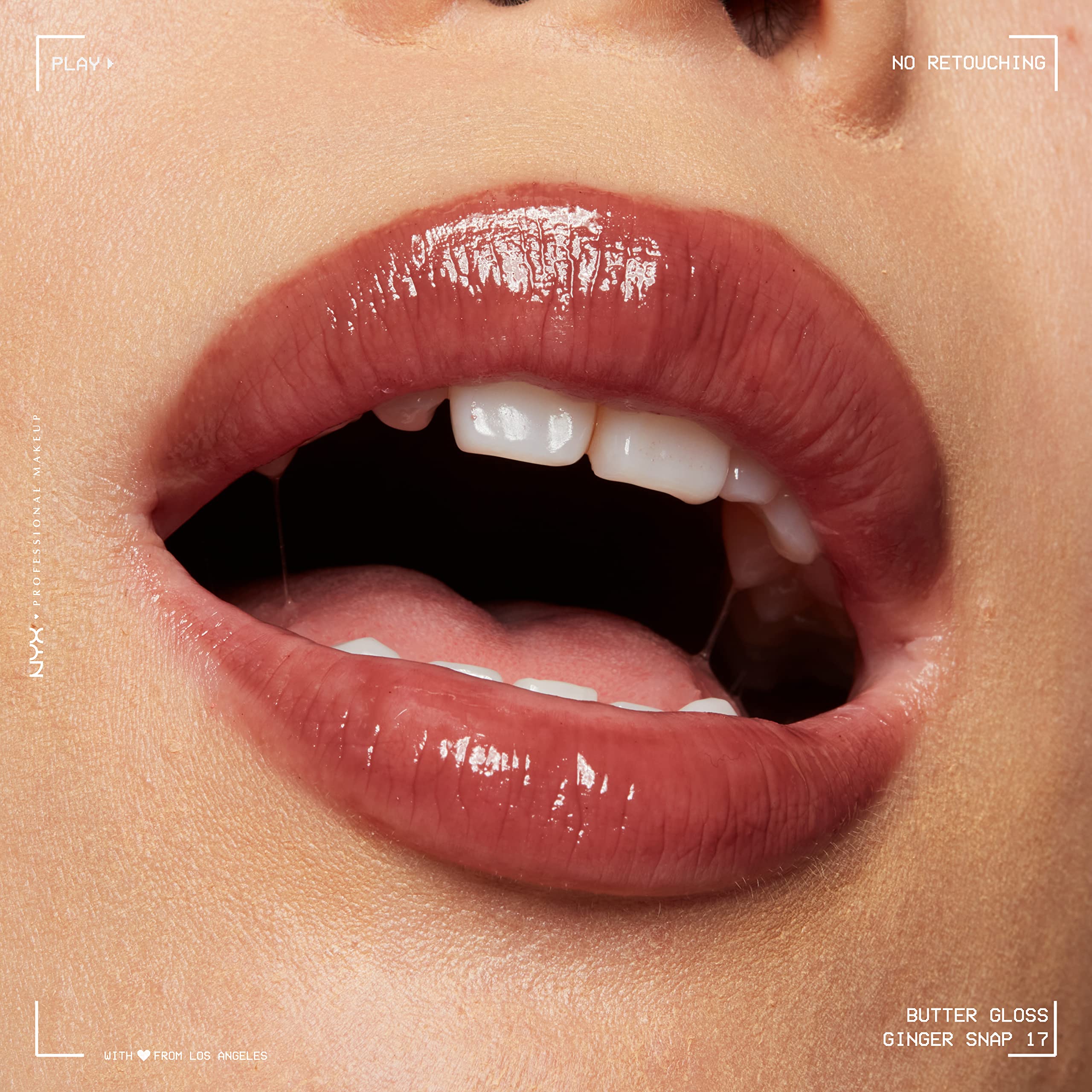 NYX Butter Gloss Ginger Snap kiss-shot demonstrates kissable color without tackiness.