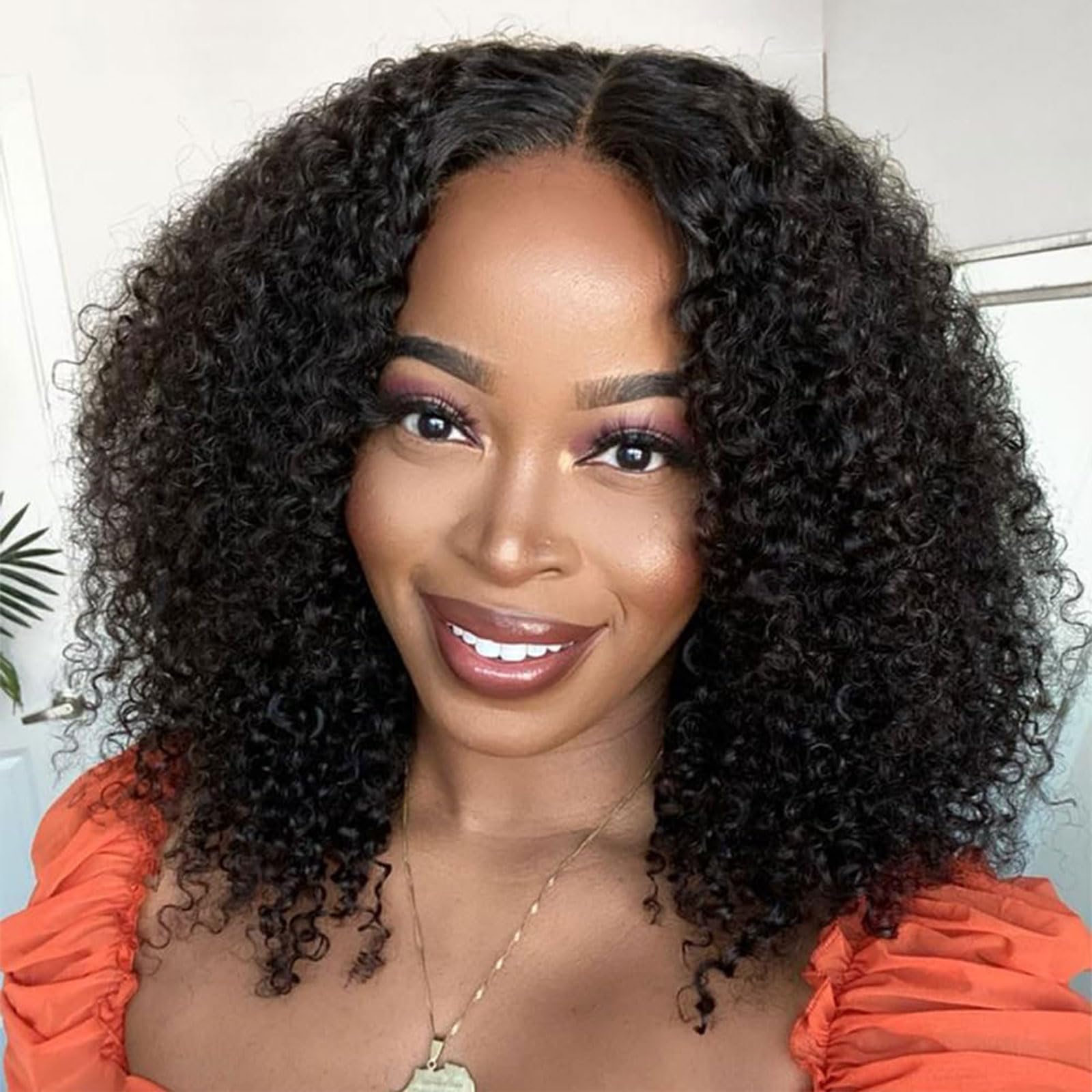 NZINZI kinky curly V-part wig top view shows a natural scalp blend for everyday wear.