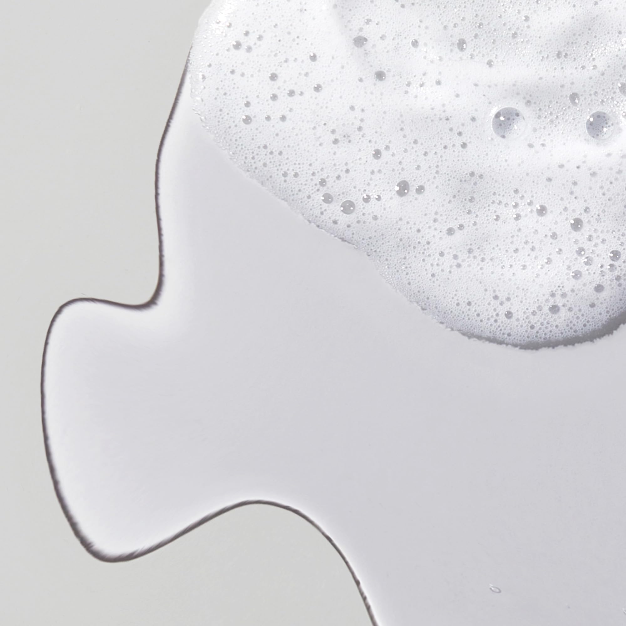 Obagi cleanser bottle side view highlights pump for easy use