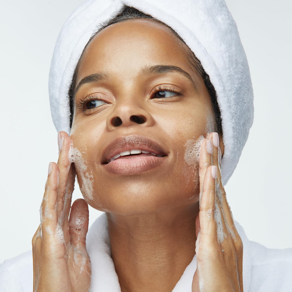 Obagi Nu-Derm Foaming Gel travel-size with label, convenient skincare companion for busy days.