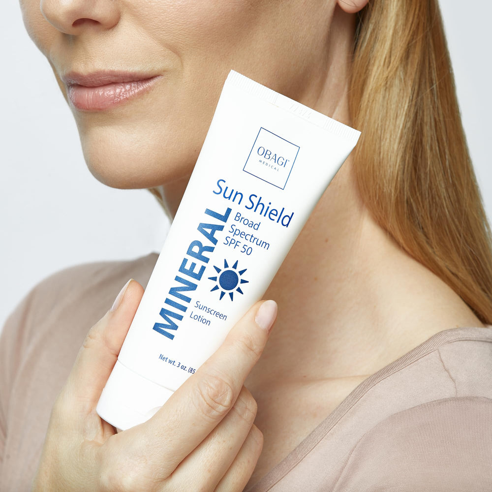 Obagi Sun Shield packaging underscores broad spectrum SPF 50 coverage.