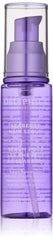 Obliphica Seaberry leave-in bottle pour shows easy frizz control and application.