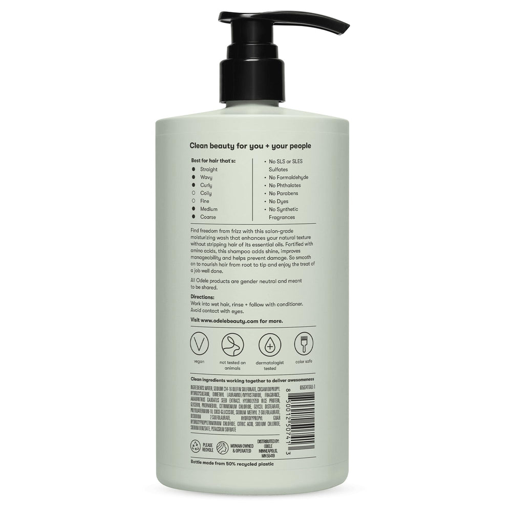 Odele smoothing shampoo on bathroom shelf conveys salon-quality shine and moisture.
