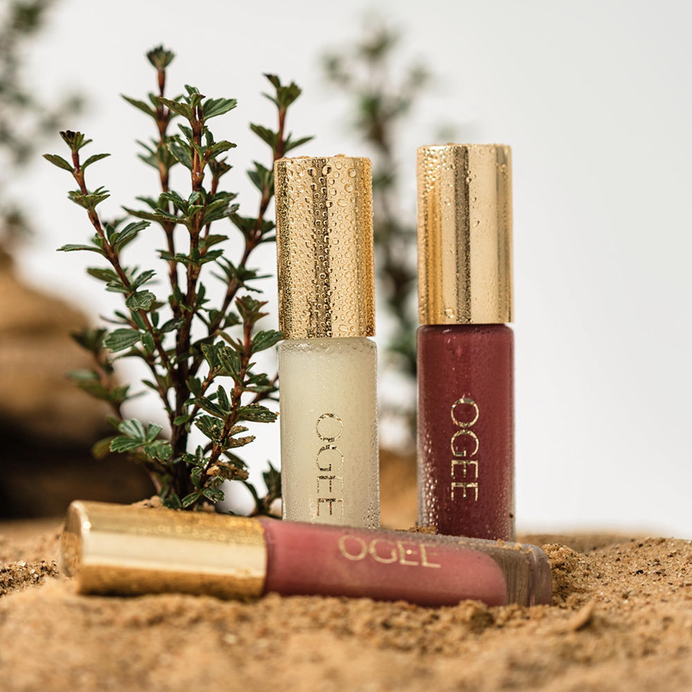 Ogee Beyond Clean Lip Gloss foxglove applicator demonstrating precise, smooth color application.