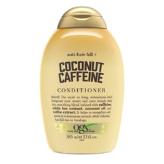 OGX anti-hair fall coconut caffeine conditioner bottle showing strengthening benefits