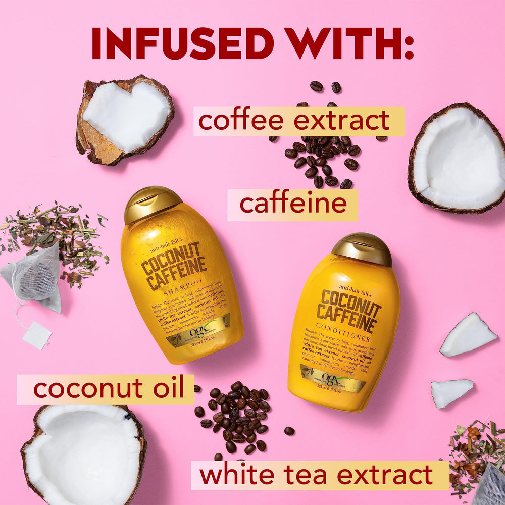 OGX Anti-Hair Fall Coconut Caffeine shampoo lather during application suggests gentle cleansing.