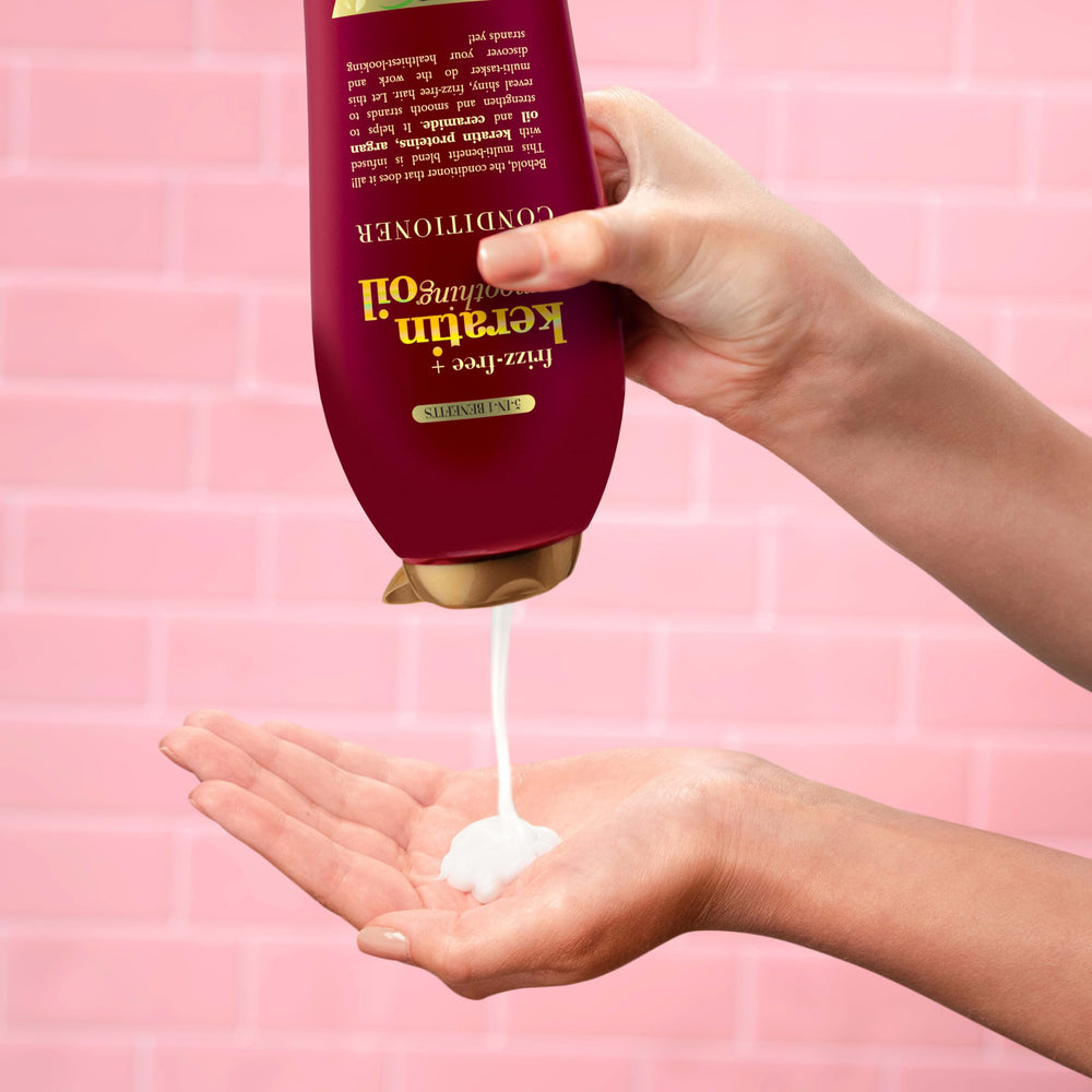 OGX Frizz-Free Keratin Smoothing Oil Conditioner demonstrates frizz control on tame hair