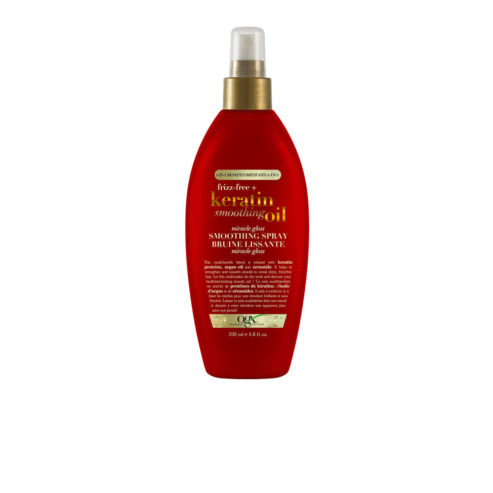OGX Frizz-Free Keratin Smoothing Oil bottle shows frizz control and shine