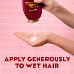 OGX Frizz-Free Shampoo sulfate-free label hints at gentle cleansing for everyday use.