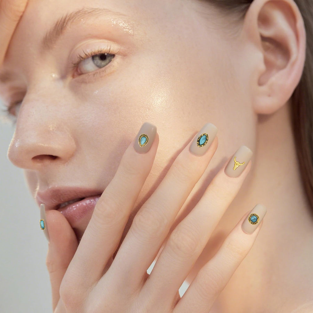 Ohmique easy-apply charms simplify creating polished western-inspired nails.