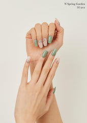 ohora N Spring Garden wraps being applied on a nail for easy transformation