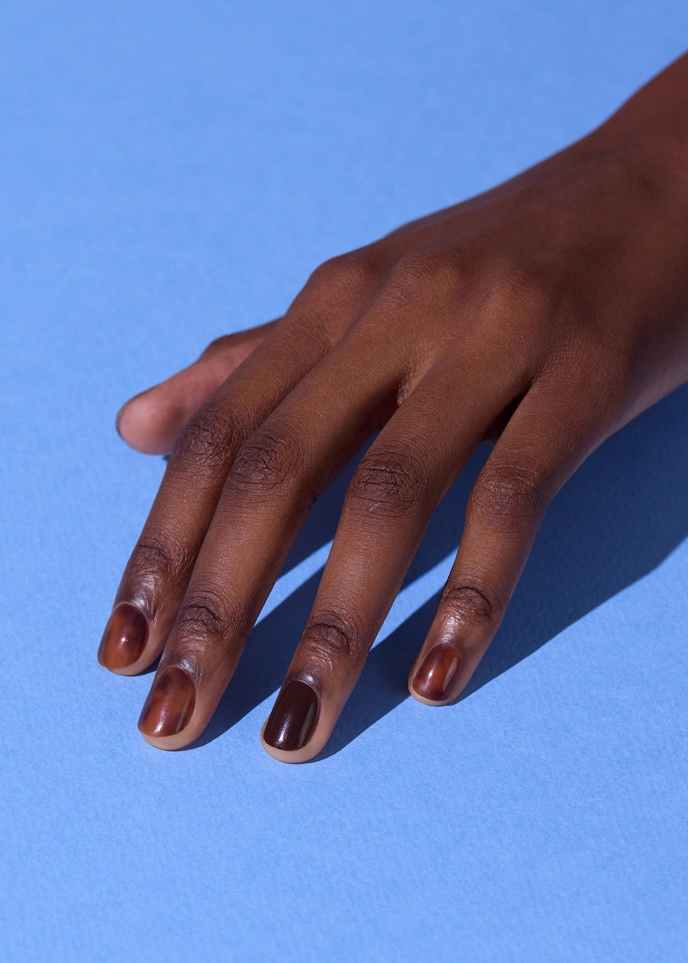 ohora Pumpkin Swirl nails close-up reveal rich brown marble design.
