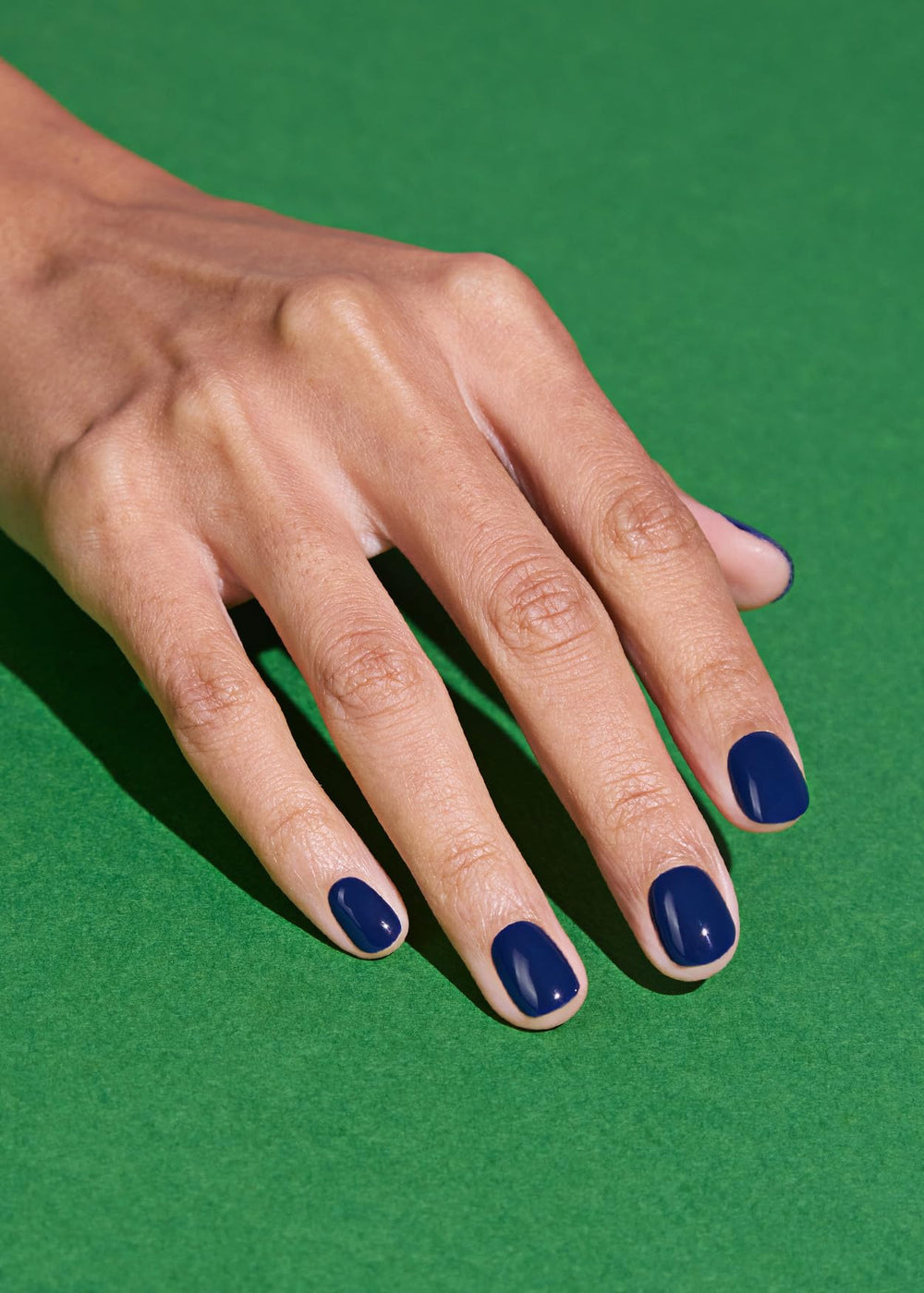 ohora N Royal Navy nail wraps after cure show a smooth, glossy finish.