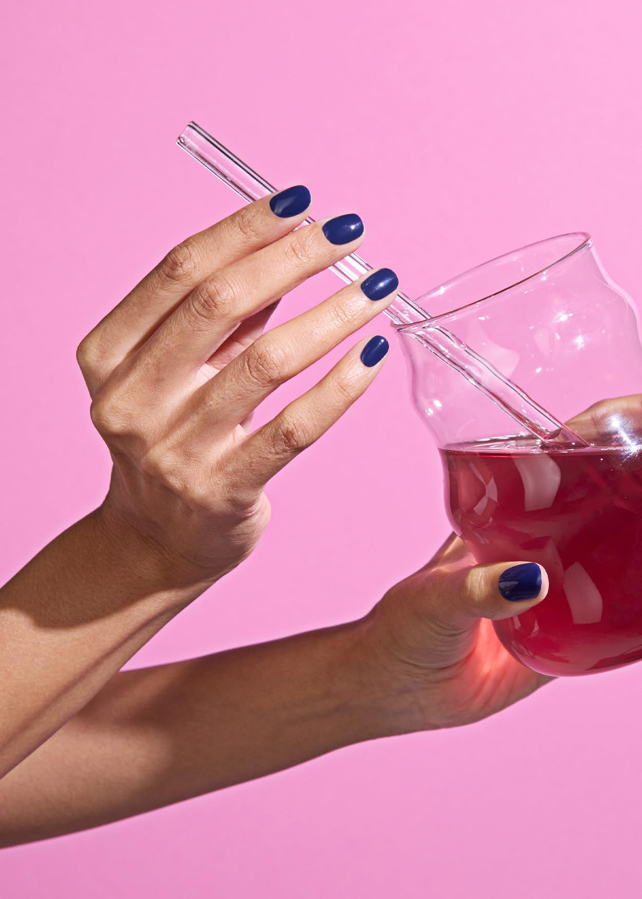 ohora N Royal Navy blue wrap application close-up for a smooth, quick at-home manicure.