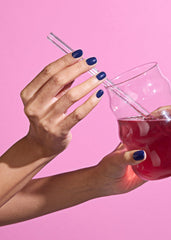 ohora N Royal Navy blue wrap application close-up for a smooth, quick at-home manicure.