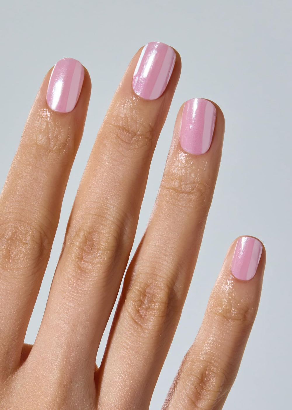 ohora semi-cured gel nail strips being applied for quick manicure at home