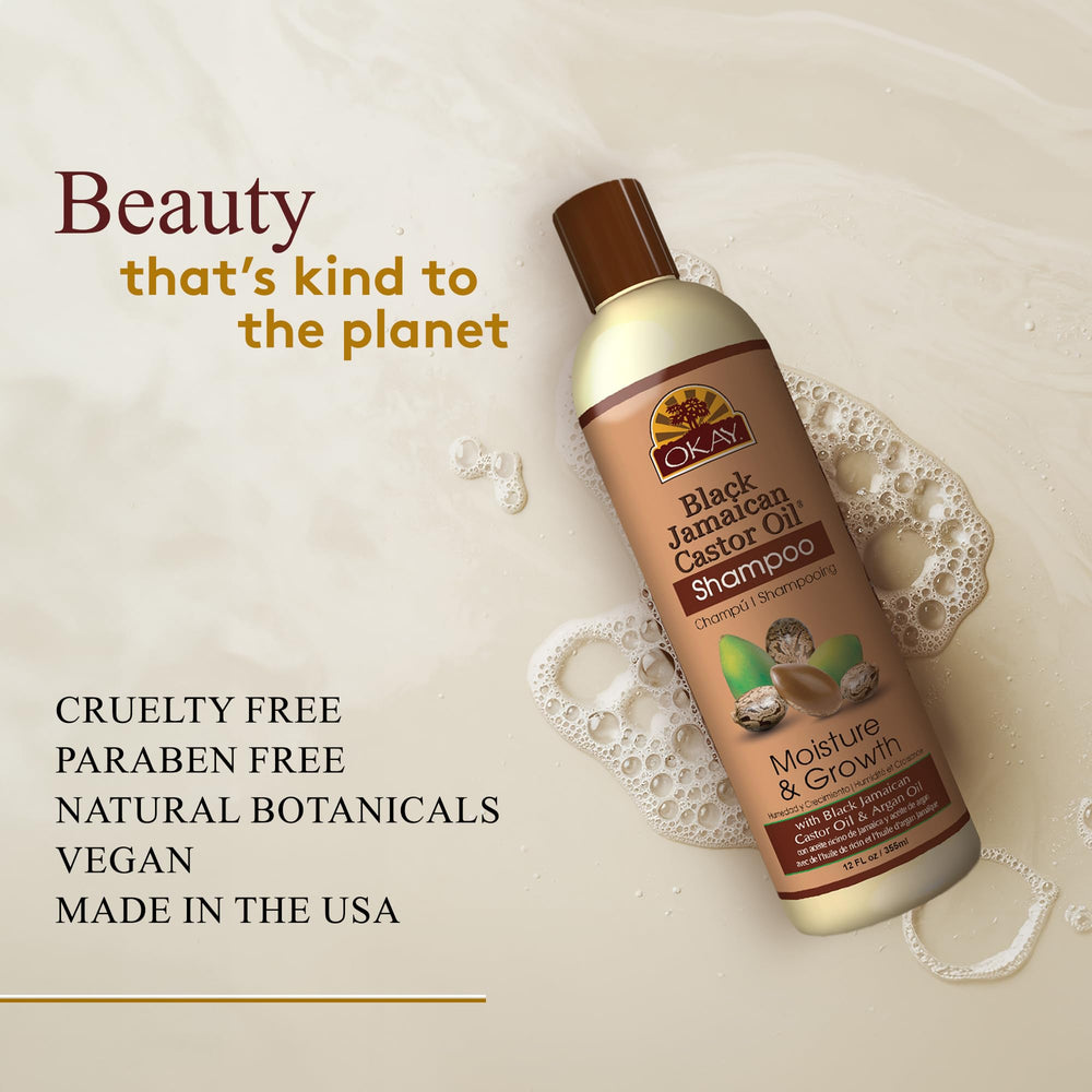 OKAY Black Jamaican Castor Shampoo applied to scalp for cleansing and gentle massaging benefits.