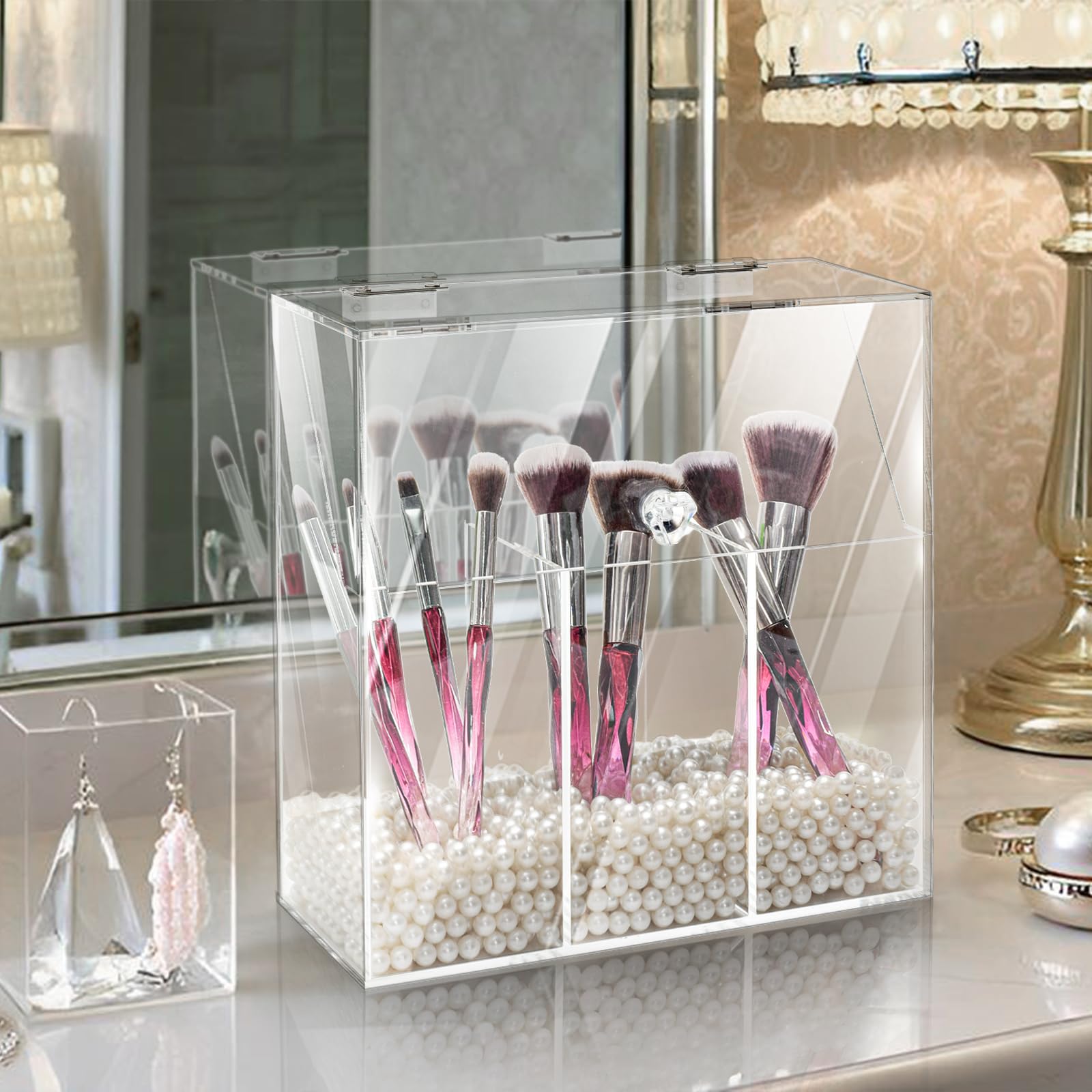 Okllen clear acrylic organizer with three compartments for cosmetics and jewelry.