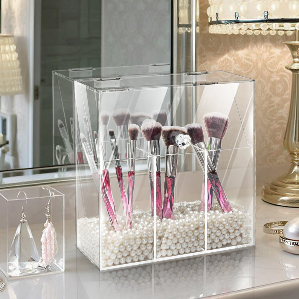 Okllen clear acrylic organizer with three compartments for cosmetics and jewelry.