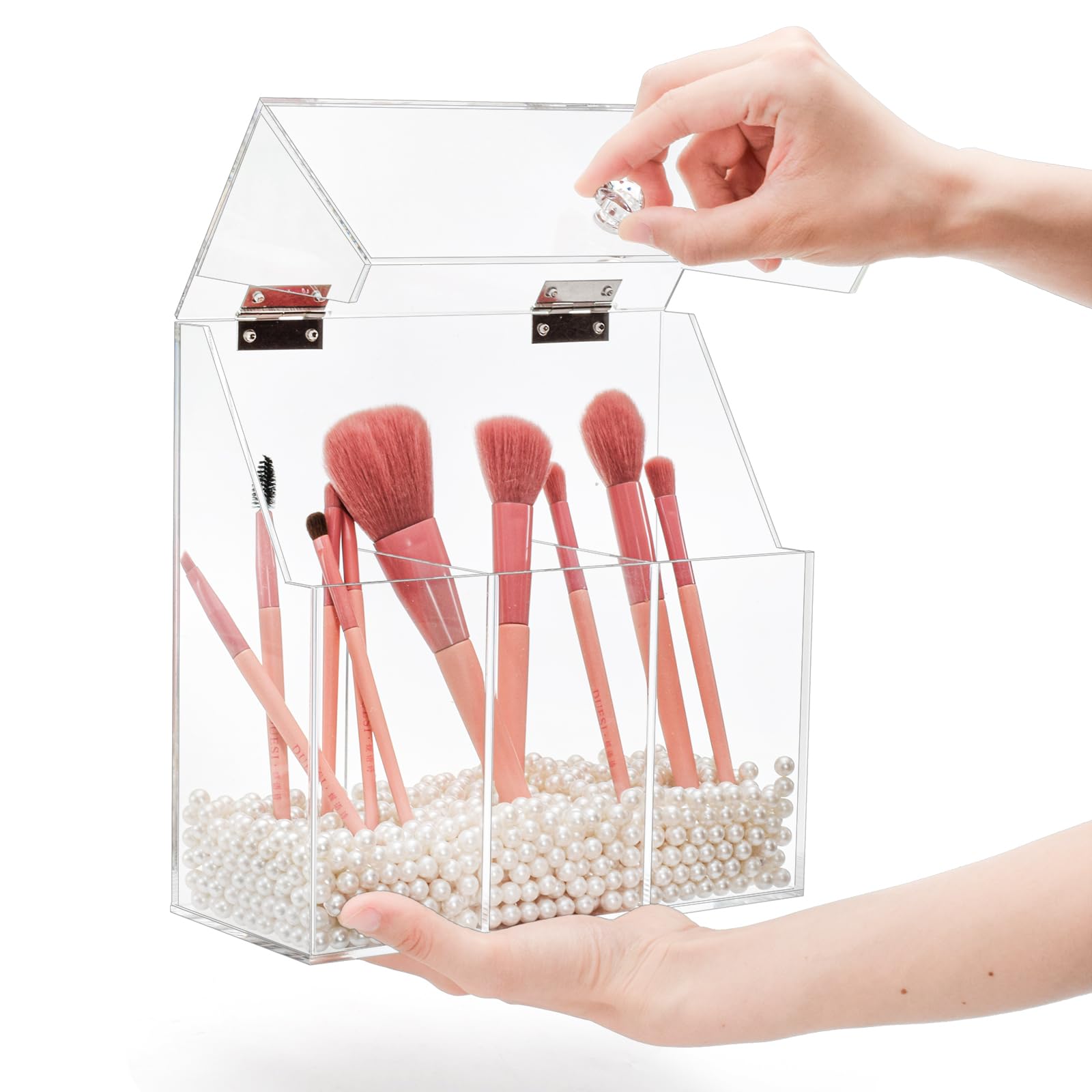 Okllen white pearls help display brushes upright for a neat vanity.