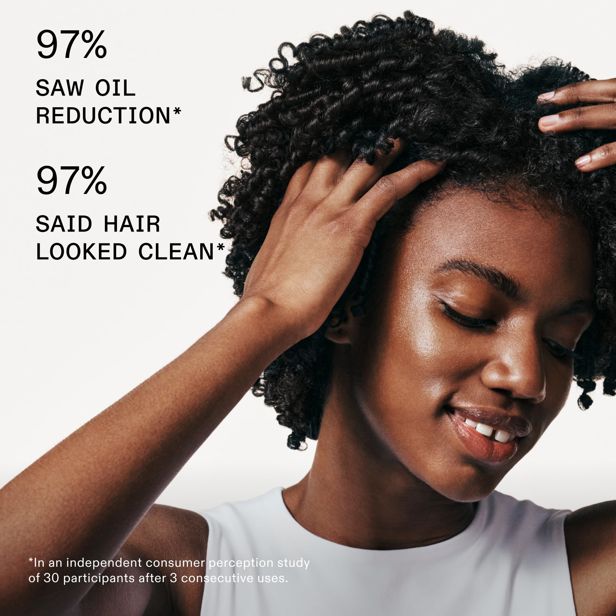 Olaplex Nº.4D spray action demonstrating fine mist for weightless refresh