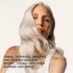 Close-up texture of Olaplex Nº.5P creamy purple conditioner, nourishing feel