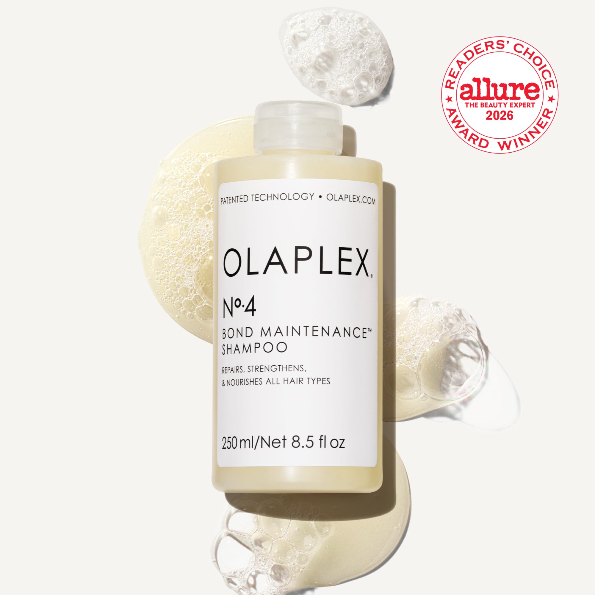 Olaplex Nº.4 pump dispensing creamy shampoo texture for easy application