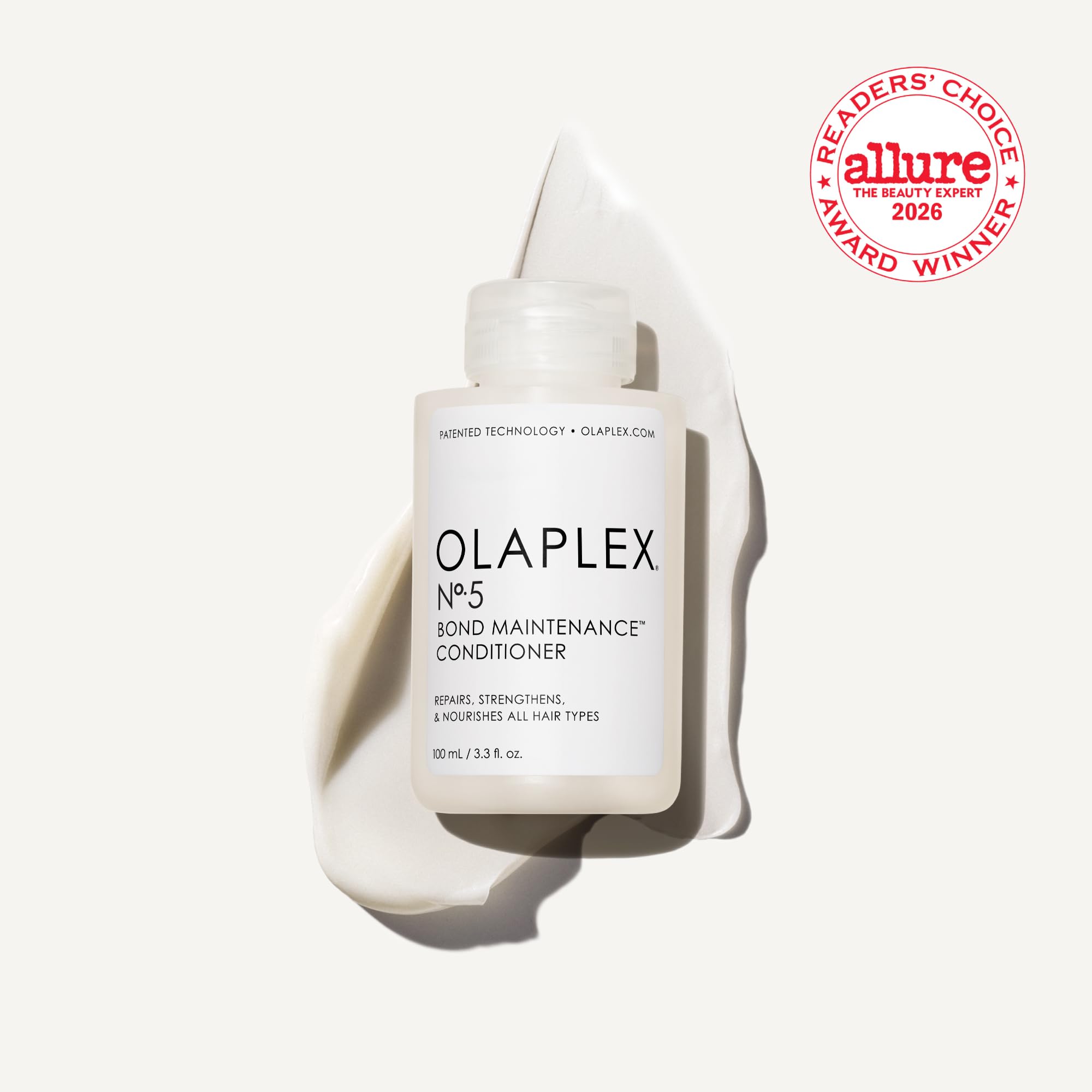 Olaplex Nº.5 conditioner texture on hand showing creamy concentrate and easy application benefit