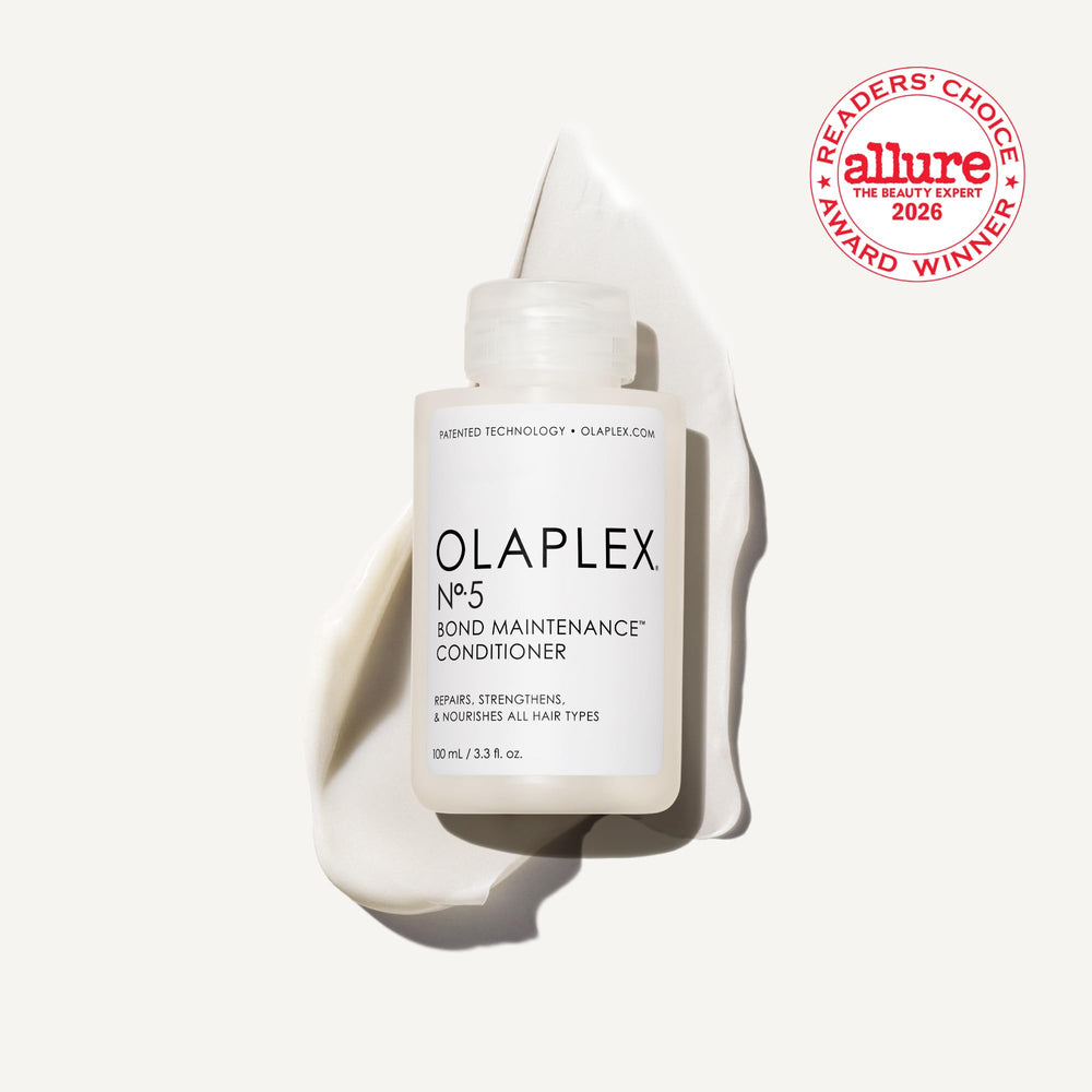 Olaplex Nº.5 conditioner texture on hand showing creamy concentrate and easy application benefit