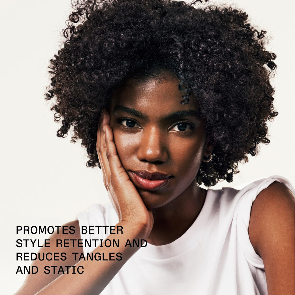 Olaplex Nº.9 serum texture close-up showing lightweight, non-greasy finish benefit