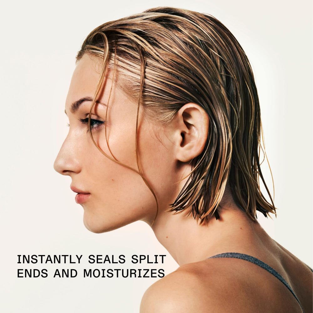 Olaplex Nº.5 being dispensed from pump showing easy controlled application
