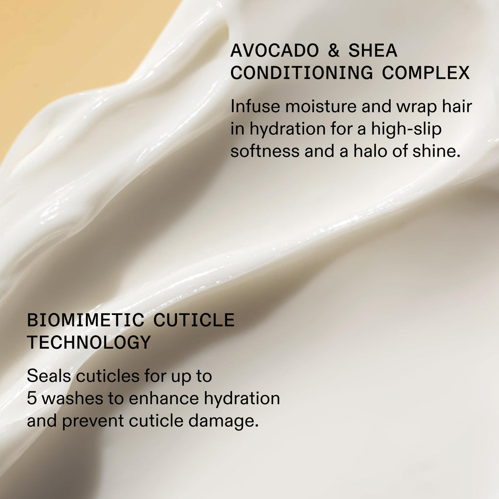 Mask dollop on palm showing Olaplex spreadability and nourishment