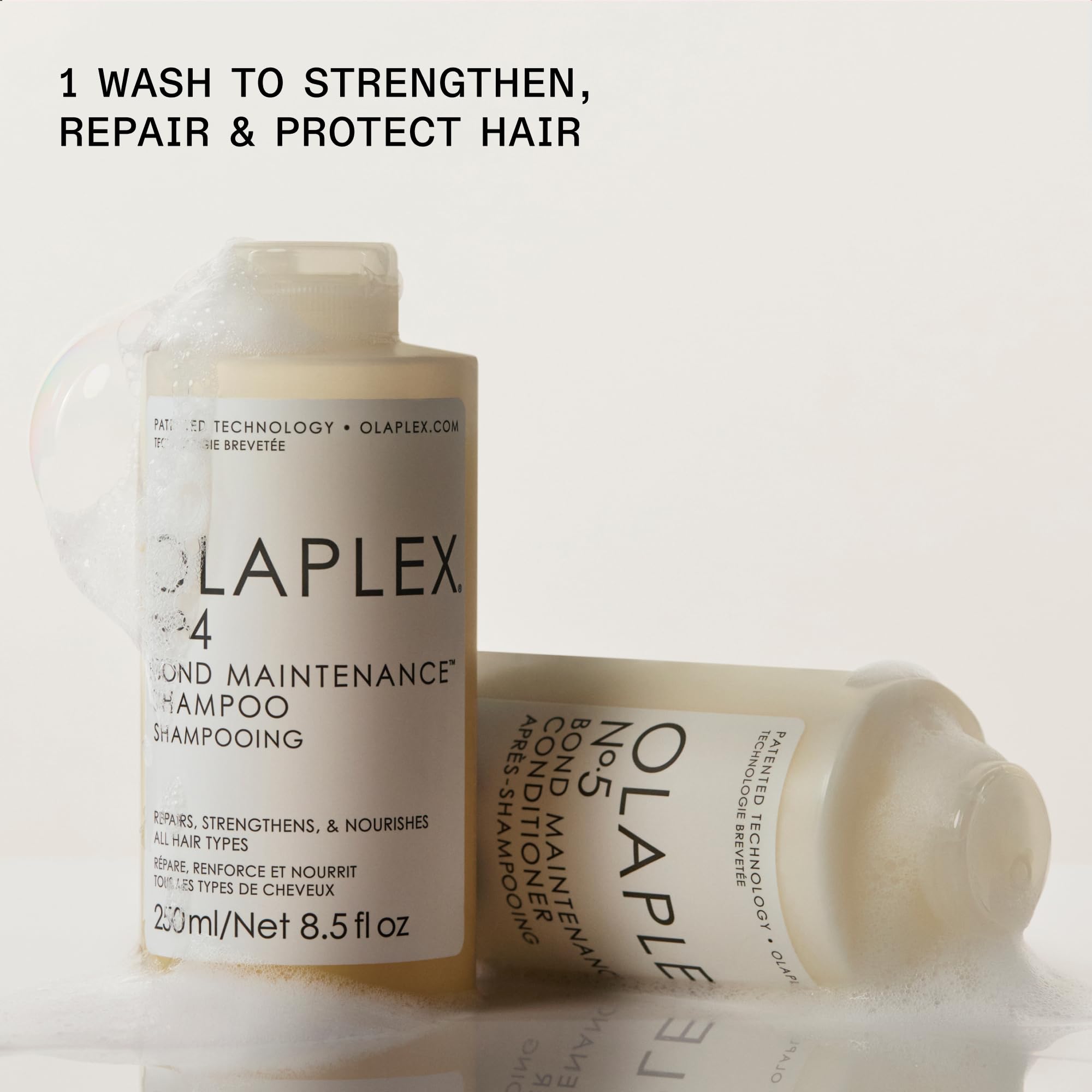 Olaplex N°4 shampoo lather on hand showing gentle cleanse and moisture