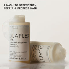 Olaplex N°4 shampoo lather on hand showing gentle cleanse and moisture