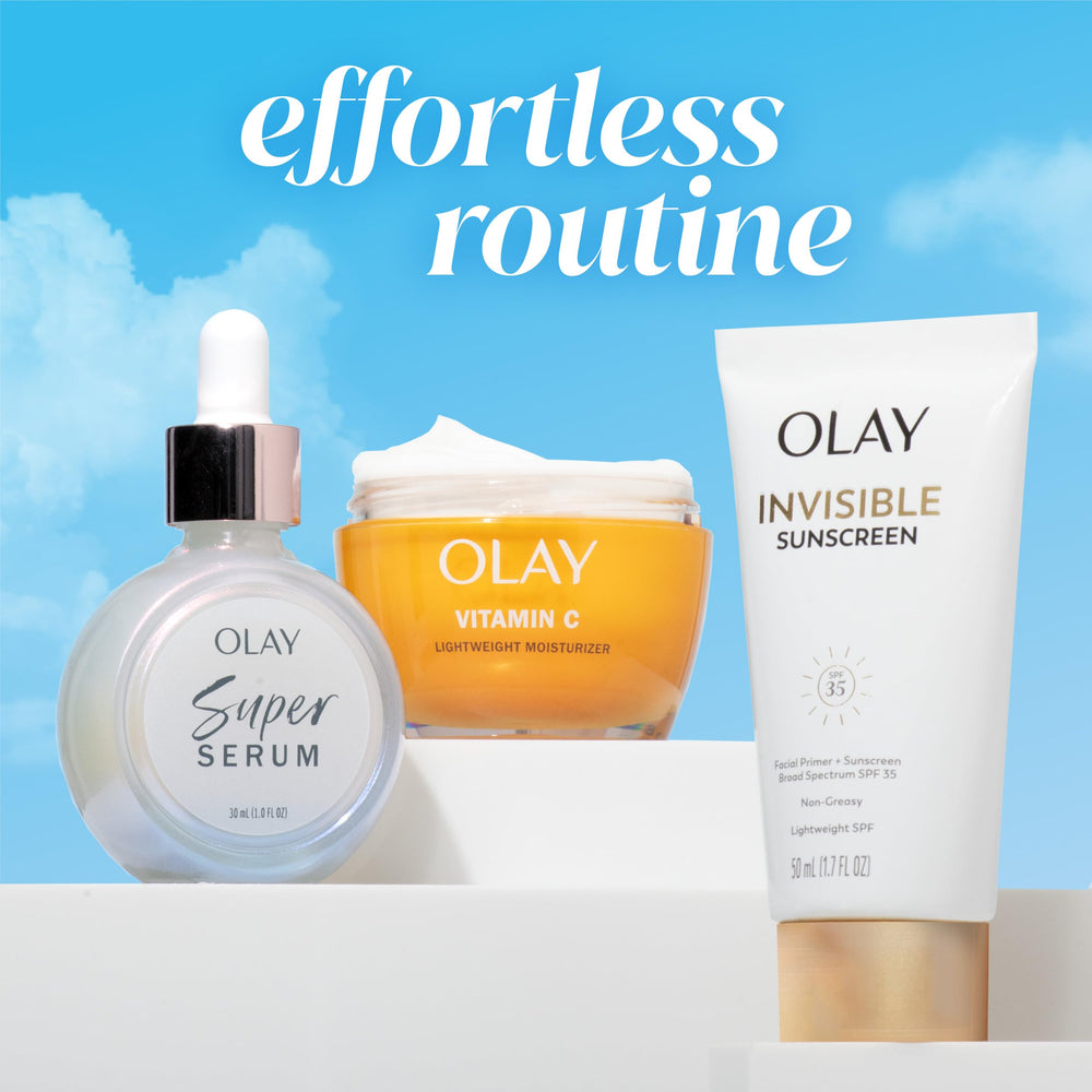 Olay Invisible Sunscreen application close-up captures seamless blending without residue.