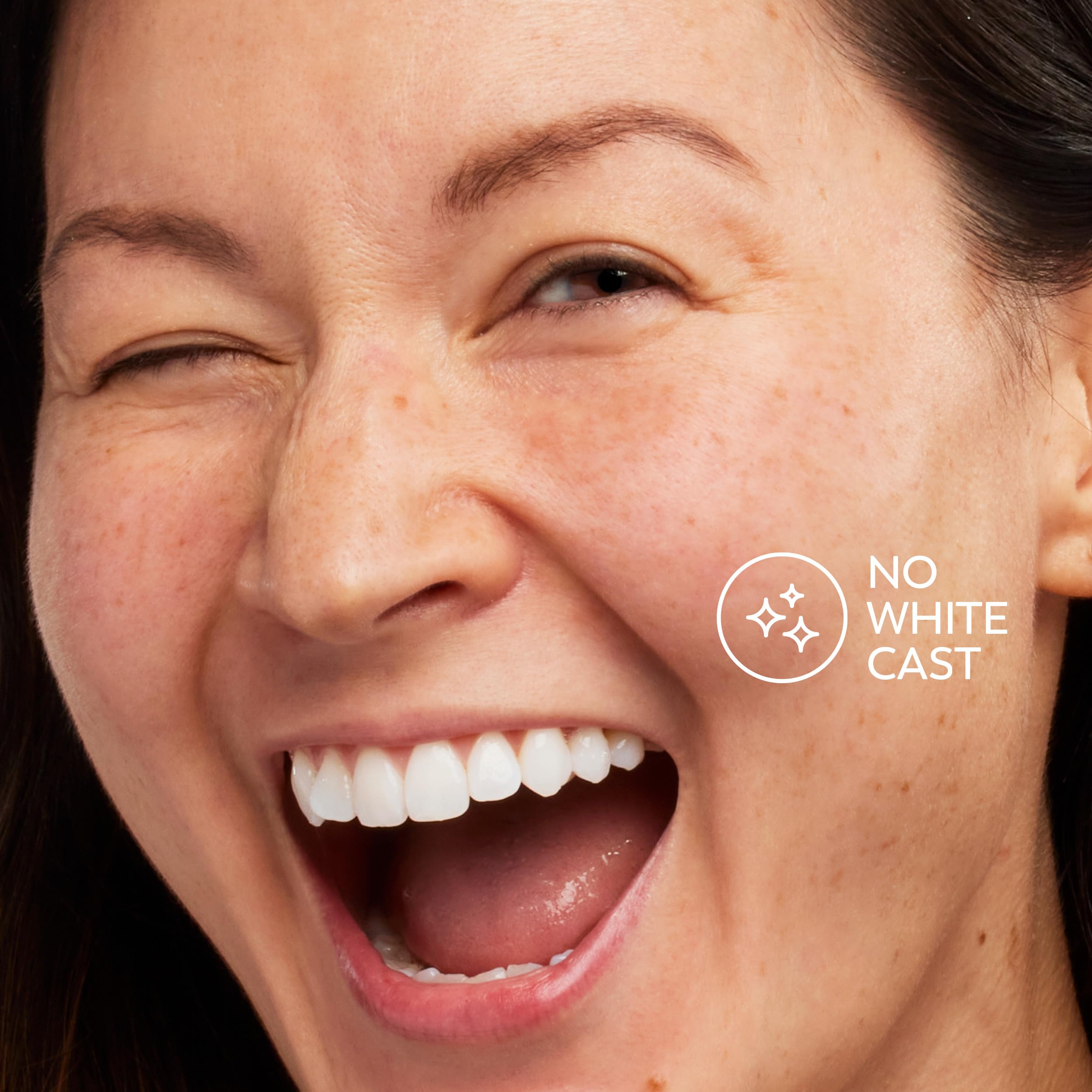 Olay Invisible Sunscreen paired with serums and moisturizers demonstrates versatile routine.