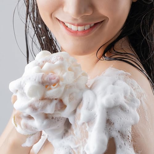 Olay Ultra Moisture lather foam texture demonstrating rich moisturizing cleansing