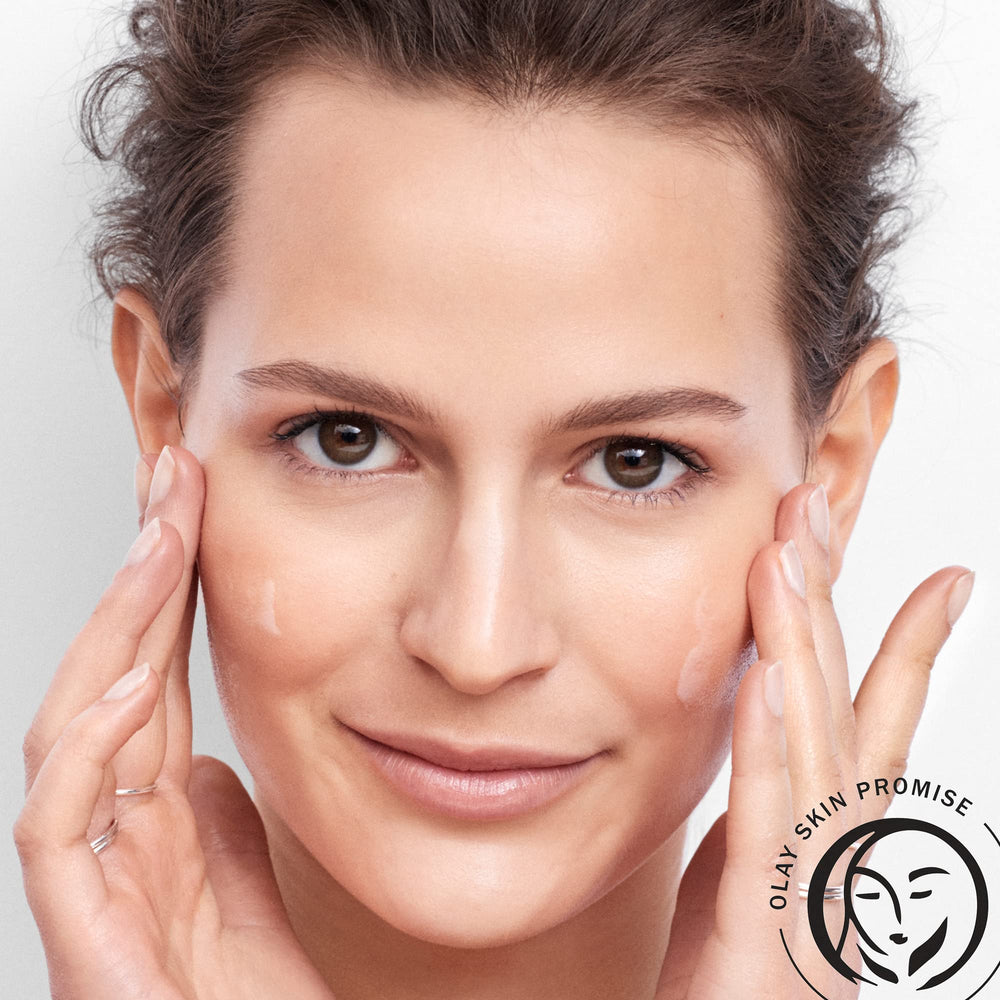 Olay Wrinkle Correction Serum ingredients label highlights niacinamide and peptides for visible skin support.