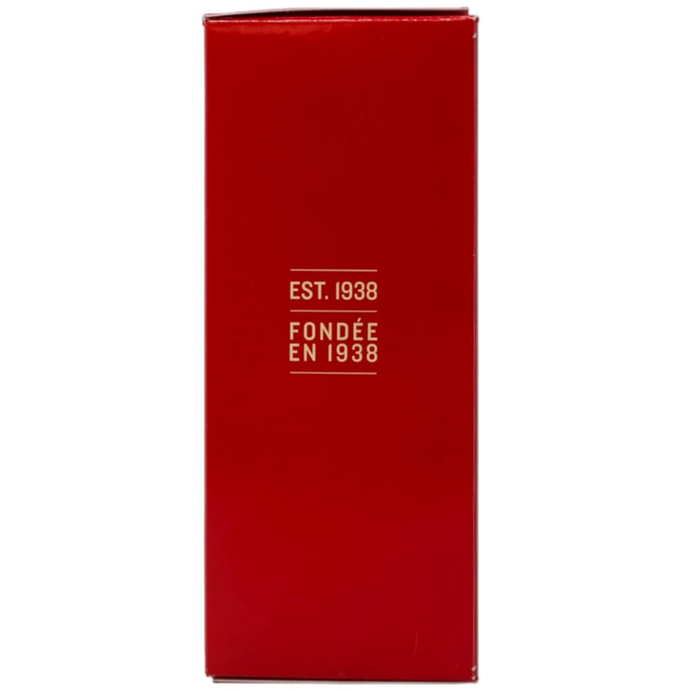 Old Spice Classic after shave being poured to finish a shave