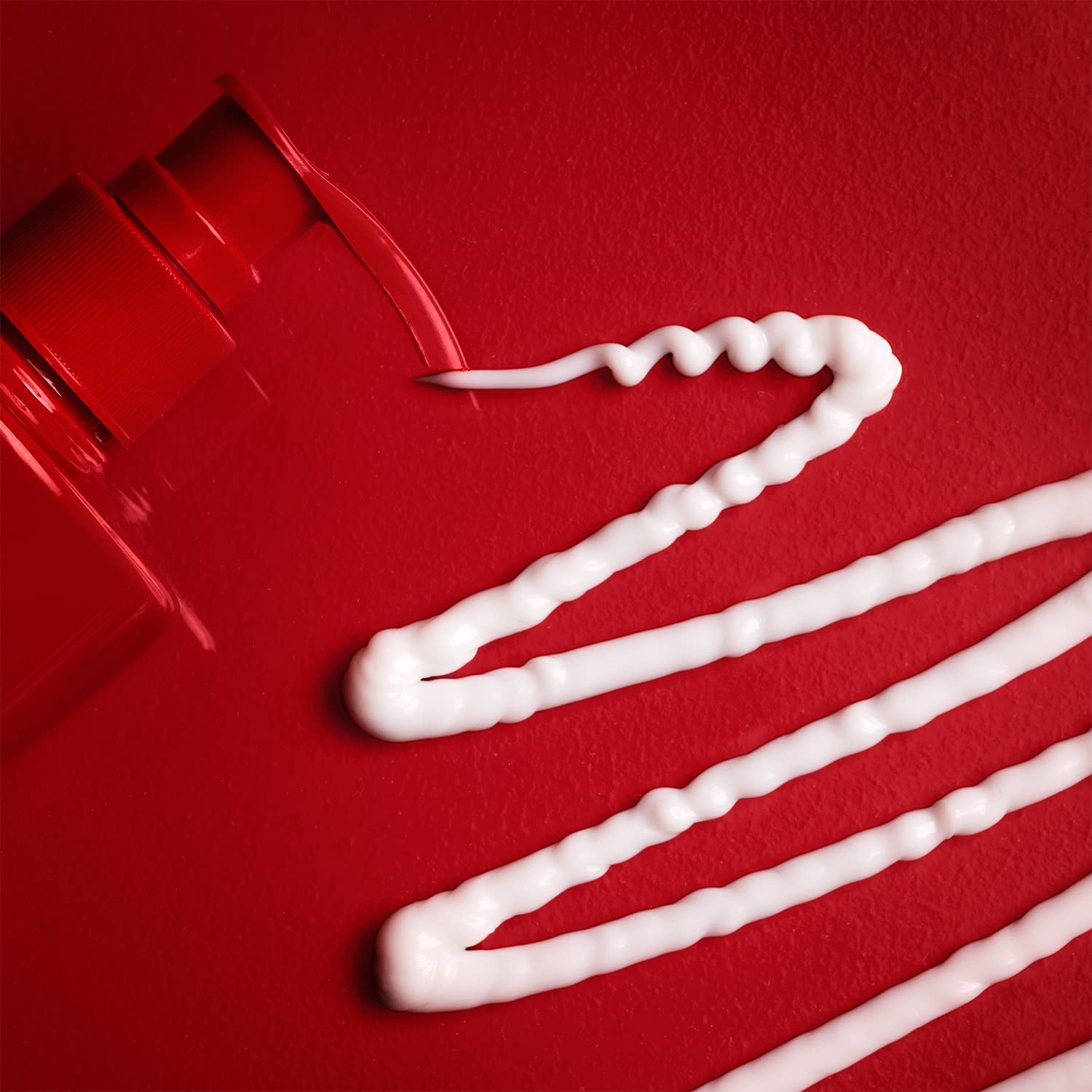 Old Spice lotion being applied on hands for daily hydration