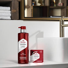 Old Spice Thickening Pomade in hand for easy daily styling.