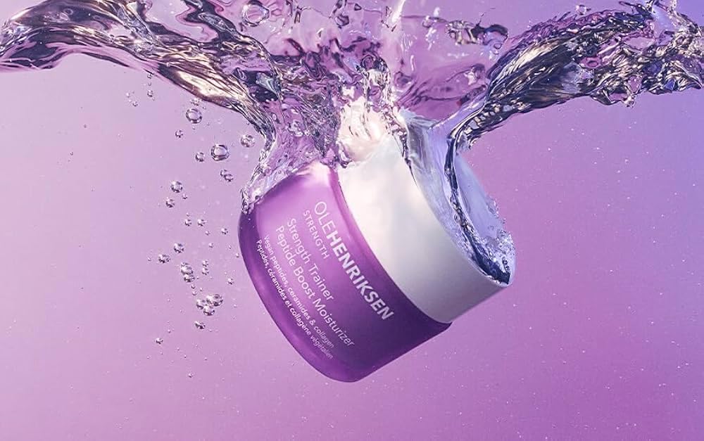 Unboxed full-size Ole Henriksen Strength Trainer Peptide Boost jar ready for daily use.