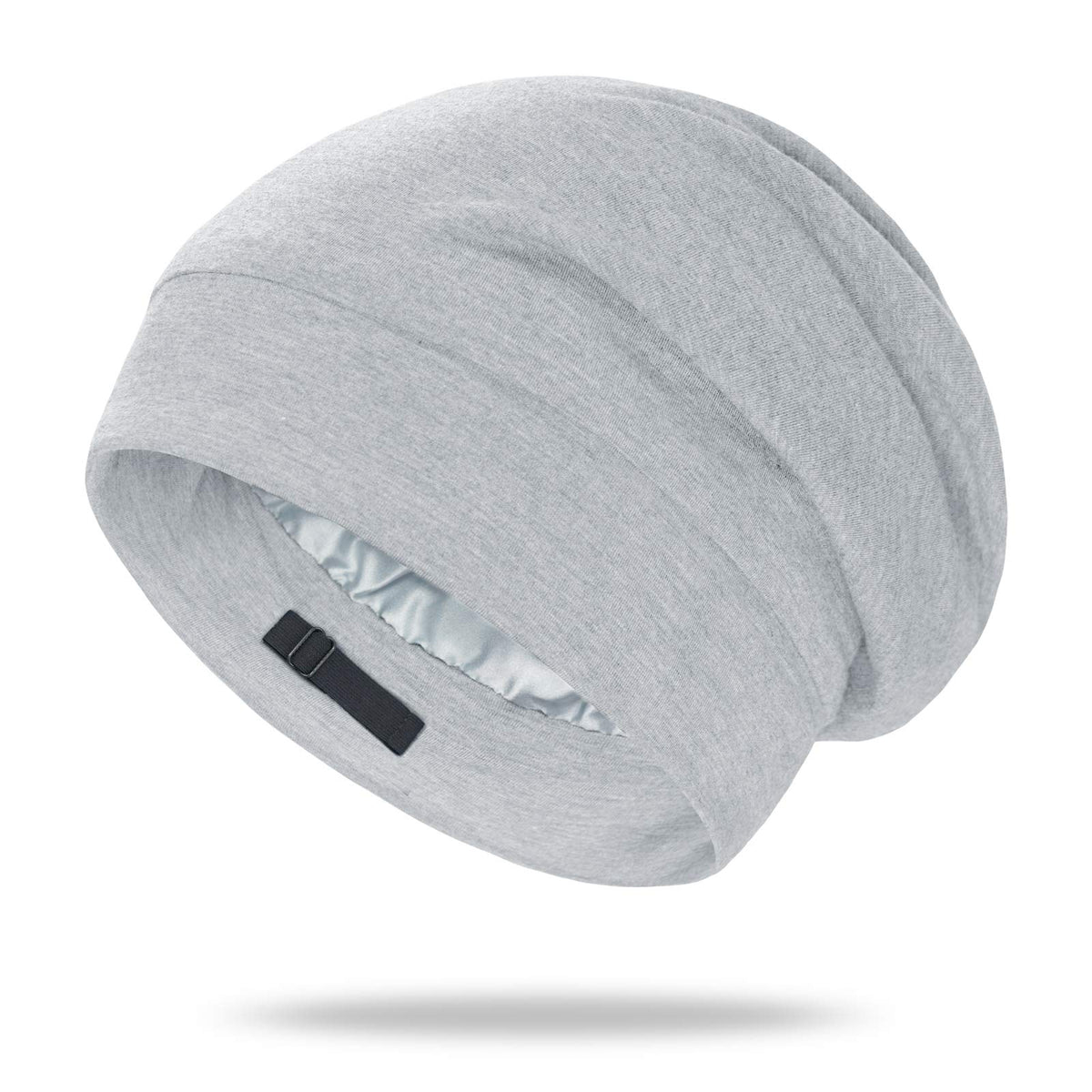OLESILK silk bonnet sleeping on model demonstrates frizz reduction and hair protection.