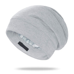 OLESILK silk bonnet sleeping on model demonstrates frizz reduction and hair protection.