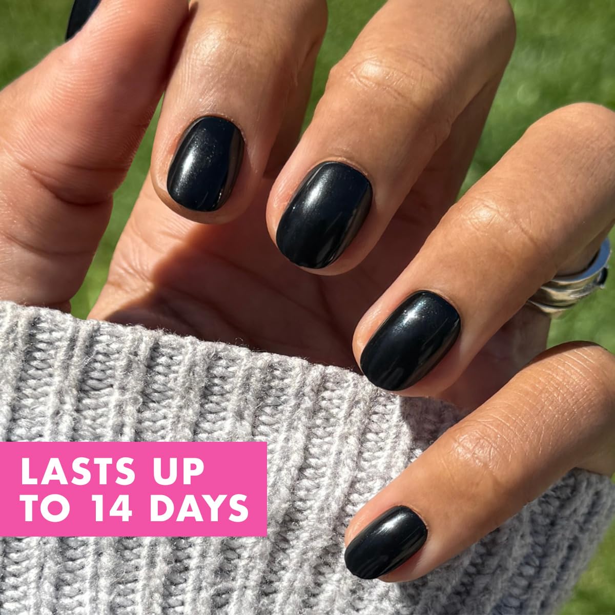 Olive &amp; June Instant Mani application glue shown ready for secure, non-toxic long wear.