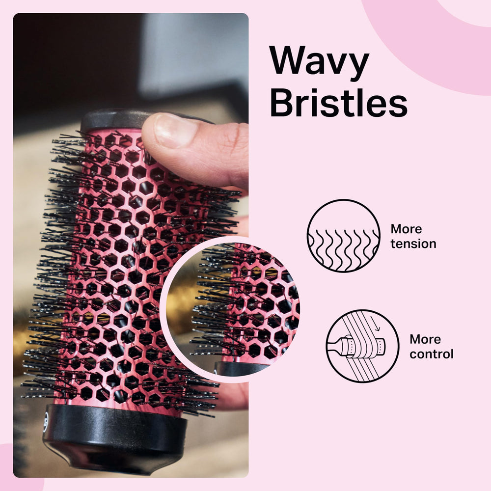 Olivia Garden MultiBrush ergonomic grip enhances comfortable styling sessions.