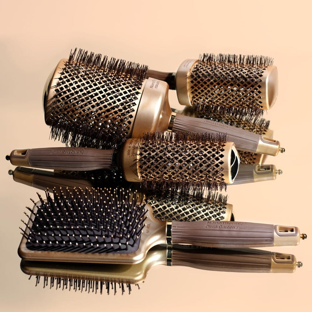 Olivia Garden NT-PDL in-use demonstrates detangling across lengths.
