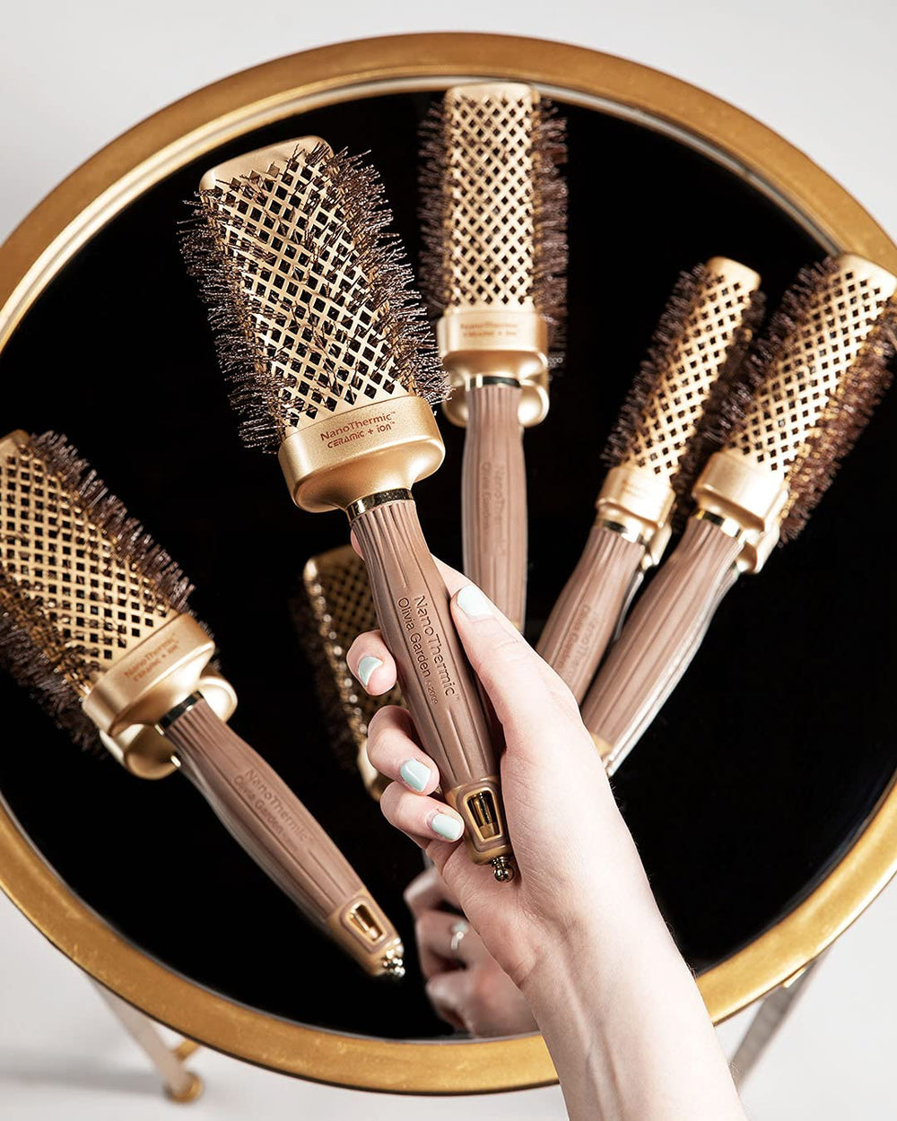 Olivia Garden Nanothermic square brush helps create salon-ready styles for normal to thick hair.