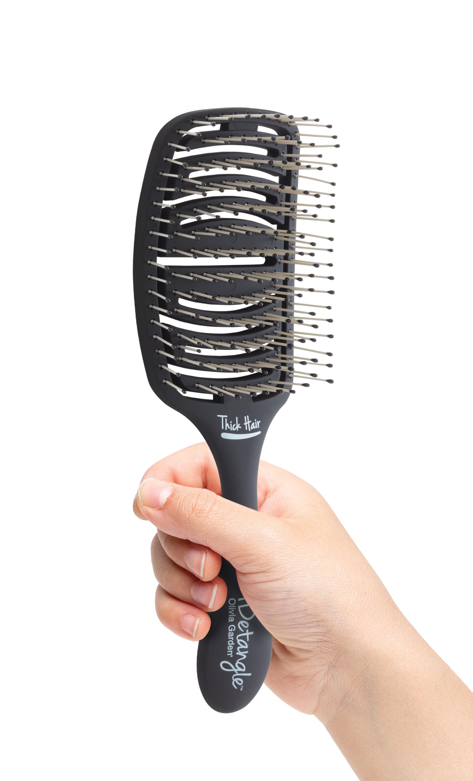 Olivia Garden iDetangle brush detangles dry hair with dual-curve comfort and even tension.