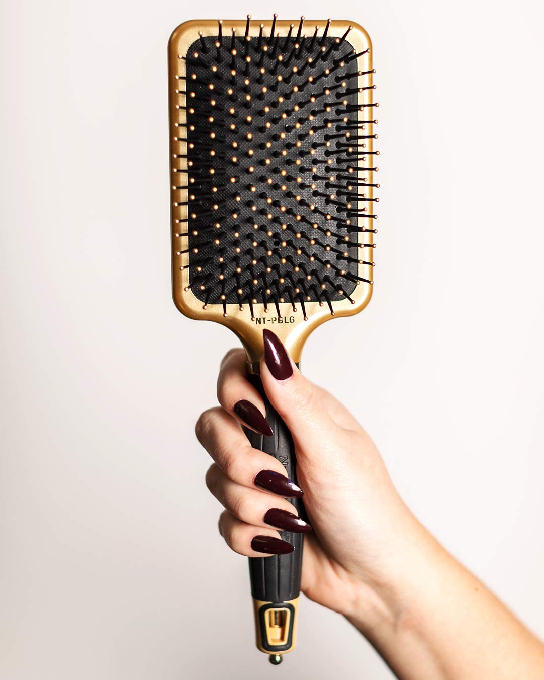 Olivia Garden NanoThermic brush bristle closeup shows ion-charged bristles for shine boost.